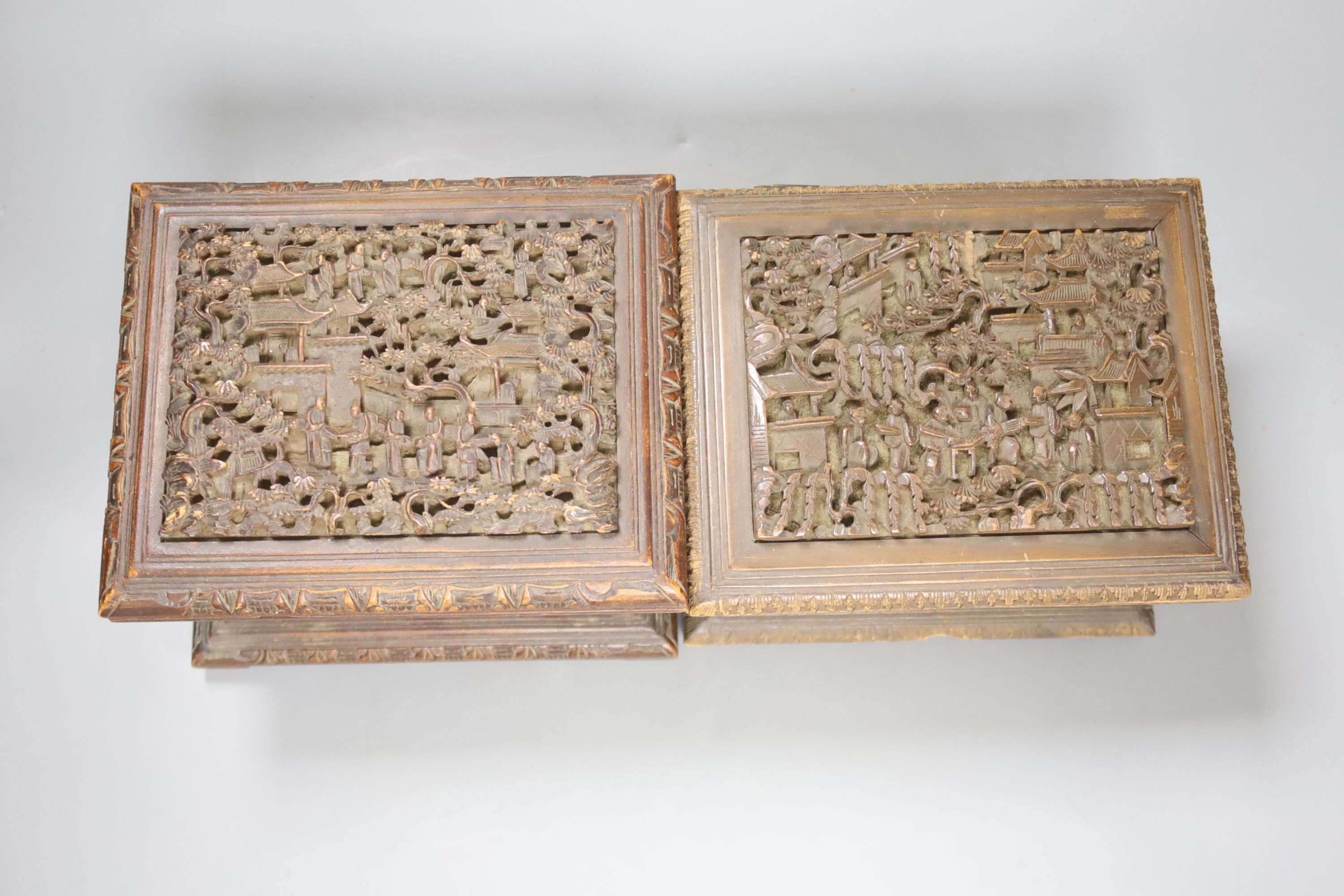 Three Chinese carved hardwood caskets, largest 19 x 15cm 13cm high